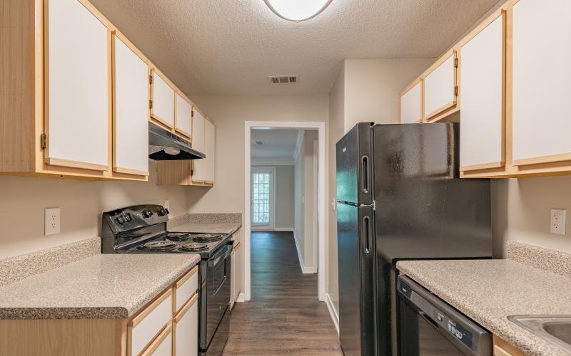 galley kitchen with lighting