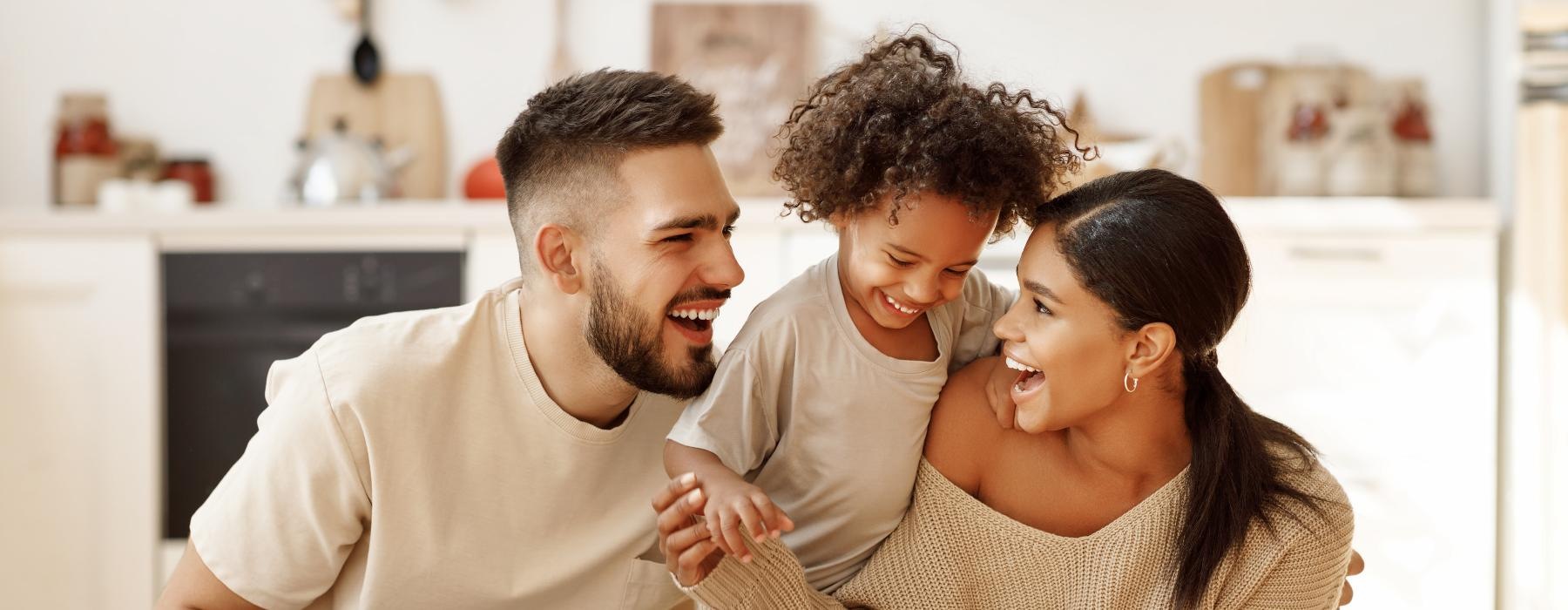 happy family sitting on the floor