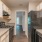 galley kitchen with lighting
